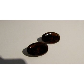 Aretes negros ovalados  de Cerámica  naranja